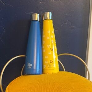 2 - Swell Blue and Yellow Bottles - Selling As A Set
